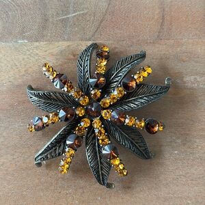 Large flower brooch signed WM